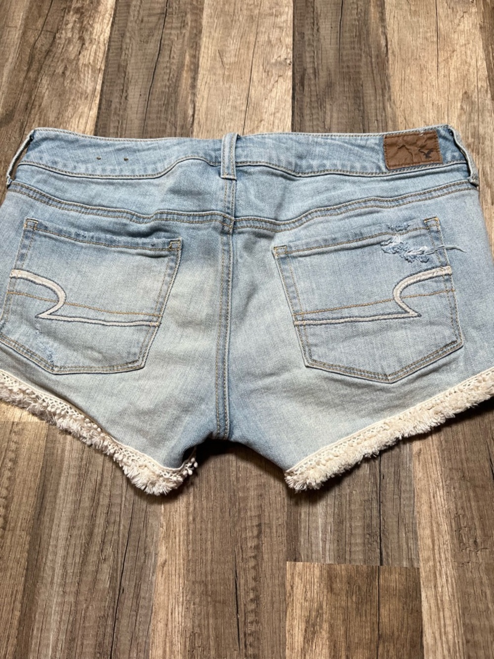American Eagle Shortie Distressed Denim Shorts Lace Crochet Trim Size 10 - Picture 9 of 16